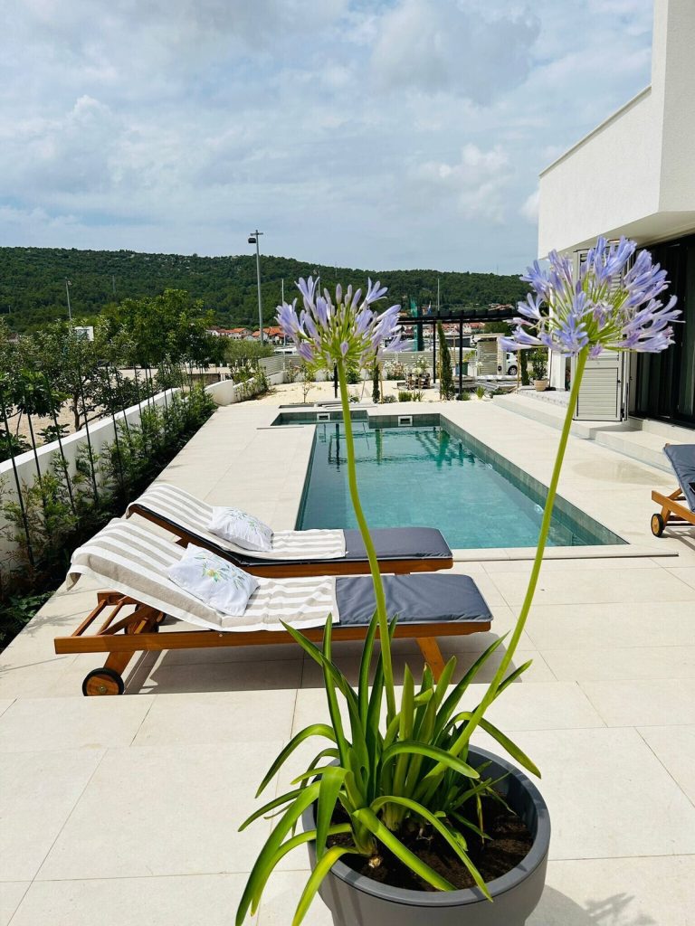 Sibenik newly built villa with a swimming pool in the first row to the sea 